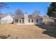 Large backyard featuring a well maintained lawn and a privacy fence perfect for outdoor enjoyment at 2794 Hillvale Cove Way, Lithonia, GA 30058