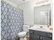 Bathroom featuring a tub, shower and a vanity at 2794 Hillvale Cove Way, Lithonia, GA 30058