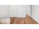 Bedroom with hardwood floors and white walls at 2794 Hillvale Cove Way, Lithonia, GA 30058