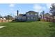 Expansive backyard featuring a lush green lawn and a deck, perfect for outdoor living and entertainment at 3185 Perch Sw Dr, Marietta, GA 30008