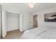 Bedroom with neutral paint, hardwood floors, closet, and natural light at 3185 Perch Sw Dr, Marietta, GA 30008