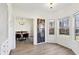 Cozy breakfast nook featuring bay windows and natural light, leading to formal dining at 3185 Perch Sw Dr, Marietta, GA 30008