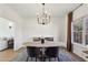 Well-lit dining room featuring contemporary chandelier and a cozy, inviting atmosphere at 3185 Perch Sw Dr, Marietta, GA 30008