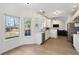 Bright, updated kitchen with stainless appliances, white cabinetry, and natural light from multiple windows at 3185 Perch Sw Dr, Marietta, GA 30008