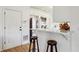 Eat in kitchen with breakfast bar, seating for two, and stainless steel appliances at 3185 Perch Sw Dr, Marietta, GA 30008