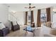 Inviting living room featuring hardwood floors, two sofas, and large windows with bright natural light at 3185 Perch Sw Dr, Marietta, GA 30008