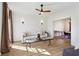 Bright and airy living room with hardwood floors, stylish furniture, and natural light streaming through the windows at 3185 Perch Sw Dr, Marietta, GA 30008