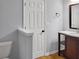 Cozy bathroom features a toilet, sink, and a full length mirror at 1649 Southgate Mill Dr, Duluth, GA 30096