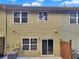 Exterior view of home's siding, windows, and sliding glass door at 1649 Southgate Mill Dr, Duluth, GA 30096