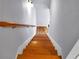 Staircase with wooden steps and handrail, ascending to the upper level at 1649 Southgate Mill Dr, Duluth, GA 30096