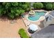 Lush lawn and landscaping surround this sprawling home's pool, patio, and rooftop at 1850 Kirkmont Nw Dr, Marietta, GA 30064