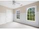 Bedroom featuring neutral walls, white trim, natural light and carpeted floor at 1850 Kirkmont Nw Dr, Marietta, GA 30064