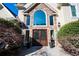 Elegant double front doors with decorative glass and stone archway at 1850 Kirkmont Nw Dr, Marietta, GA 30064