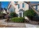 Beautifully landscaped front yard with lush greenery and a welcoming walkway at 1850 Kirkmont Nw Dr, Marietta, GA 30064