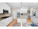 This kitchen is equipped with stainless steel appliances, a gas cooktop, double ovens, and granite countertops at 1850 Kirkmont Nw Dr, Marietta, GA 30064