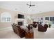 Spacious living room with fireplace, vaulted ceiling, and French doors at 1850 Kirkmont Nw Dr, Marietta, GA 30064