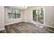 Bright dining area with patio access and natural light to backyard at 5474 Post Road Pass, Stone Mountain, GA 30088