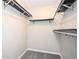 A walk-in closet with installed shelving, providing ample storage space at 5474 Post Road Pass, Stone Mountain, GA 30088
