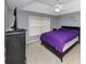 Bedroom featuring carpet flooring, grey walls, and a ceiling fan at 5705 Mountain Cres, Stone Mountain, GA 30087