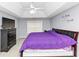Bedroom featuring carpet flooring, grey walls, and a ceiling fan at 5705 Mountain Cres, Stone Mountain, GA 30087