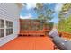 Spacious wooden deck with built-in seating and a grill, perfect for outdoor entertaining at 5705 Mountain Cres, Stone Mountain, GA 30087