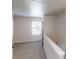Well lit bedroom with window and neutral carpeting at 1010 Nandina Ct, Villa Rica, GA 30180