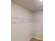 Walk-in closet with wire shelving and carpeting at 1010 Nandina Ct, Villa Rica, GA 30180