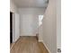 Entryway with wood-look flooring, closet, staircase, and white trim at 1010 Nandina Ct, Villa Rica, GA 30180