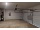 Spacious two car garage featuring an automatic door and utility hookups at 1010 Nandina Ct, Villa Rica, GA 30180