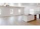 Open concept kitchen with granite counters, stainless appliances, and spacious island with sink at 1010 Nandina Ct, Villa Rica, GA 30180