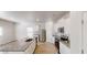 Open kitchen featuring granite counters, white cabinets, stainless appliances and an island with a sink at 1010 Nandina Ct, Villa Rica, GA 30180