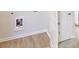 Laundry room hookups with wire rack and access to main room at 1010 Nandina Ct, Villa Rica, GA 30180
