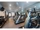 Well-equipped fitness center with treadmills, weights, and mirrored walls at Tuscany Condominiums at 955 Juniper Ne St # 4229, Atlanta, GA 30309