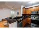 Stylish kitchen featuring a breakfast bar, stainless appliances, and modern cabinets at 955 Juniper Ne St # 4229, Atlanta, GA 30309