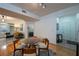 Open living space includes dining area, living room with a fireplace, and bright light at 955 Juniper Ne St # 4229, Atlanta, GA 30309
