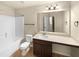 Bathroom features a shower, tile flooring, and a vanity with sink at 2100 Trinity Mill Dr, Dacula, GA 30019