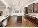 Modern kitchen featuring granite countertops and stainless steel appliances at 2100 Trinity Mill Dr, Dacula, GA 30019