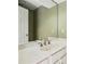 Well-lit bathroom with a modern sink, large mirror, and white vanity at 3454 Ashwood Ln, Atlanta, GA 30341