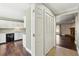 Open-concept area showcasing hardwood floors, neutral walls, and doorway leading to kitchen at 3454 Ashwood Ln, Atlanta, GA 30341