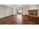 Spacious living area featuring hardwood floors, brick fireplace, and sliding doors for natural light at 3454 Ashwood Ln, Atlanta, GA 30341