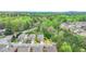 Brick home's property lines in a lush, wooded neighborhood with easy highway access and nearby amenities at 6845 Rocking Horse Ln, Cumming, GA 30040
