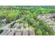 Charming two-story home on a lot with mature trees in a suburban neighborhood, conveniently located near a main road at 6845 Rocking Horse Ln, Cumming, GA 30040