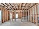 Unfinished basement with wooden frames, insulation and concrete flooring ready to be customized for your specific needs at 6845 Rocking Horse Ln, Cumming, GA 30040