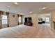 Bonus room featuring plush carpet, recessed lighting, TV, and a doorway to a bedroom at 6845 Rocking Horse Ln, Cumming, GA 30040