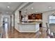 Beautiful eat-in kitchen includes granite counters, stainless appliances, and ample cabinet space at 6845 Rocking Horse Ln, Cumming, GA 30040