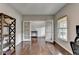 Home office with french doors, hardwood floors, and lots of natural light at 6845 Rocking Horse Ln, Cumming, GA 30040