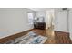 Bedroom showcasing a wood dresser, luxury vinyl flooring, and a window at 1150 Collier Nw Rd # C10, Atlanta, GA 30318