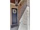 Close-up of front door and the light colored brick at 118 Via Roma, Woodstock, GA 30188