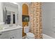 Bright bathroom with a modern vanity, decorative shower curtain, and stylish accents at 125 Werner Brook Sw Way, Atlanta, GA 30354