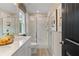 Bright bathroom with double sinks, a spacious shower, and modern fixtures at 125 Werner Brook Sw Way, Atlanta, GA 30354